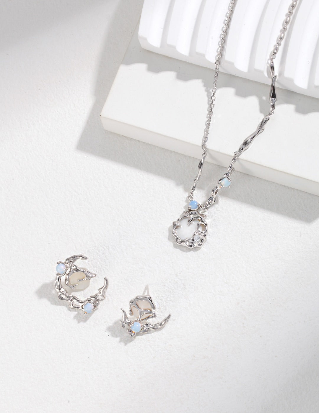 Moonlight Collection Sterling Silver Asymmetrical Earrings